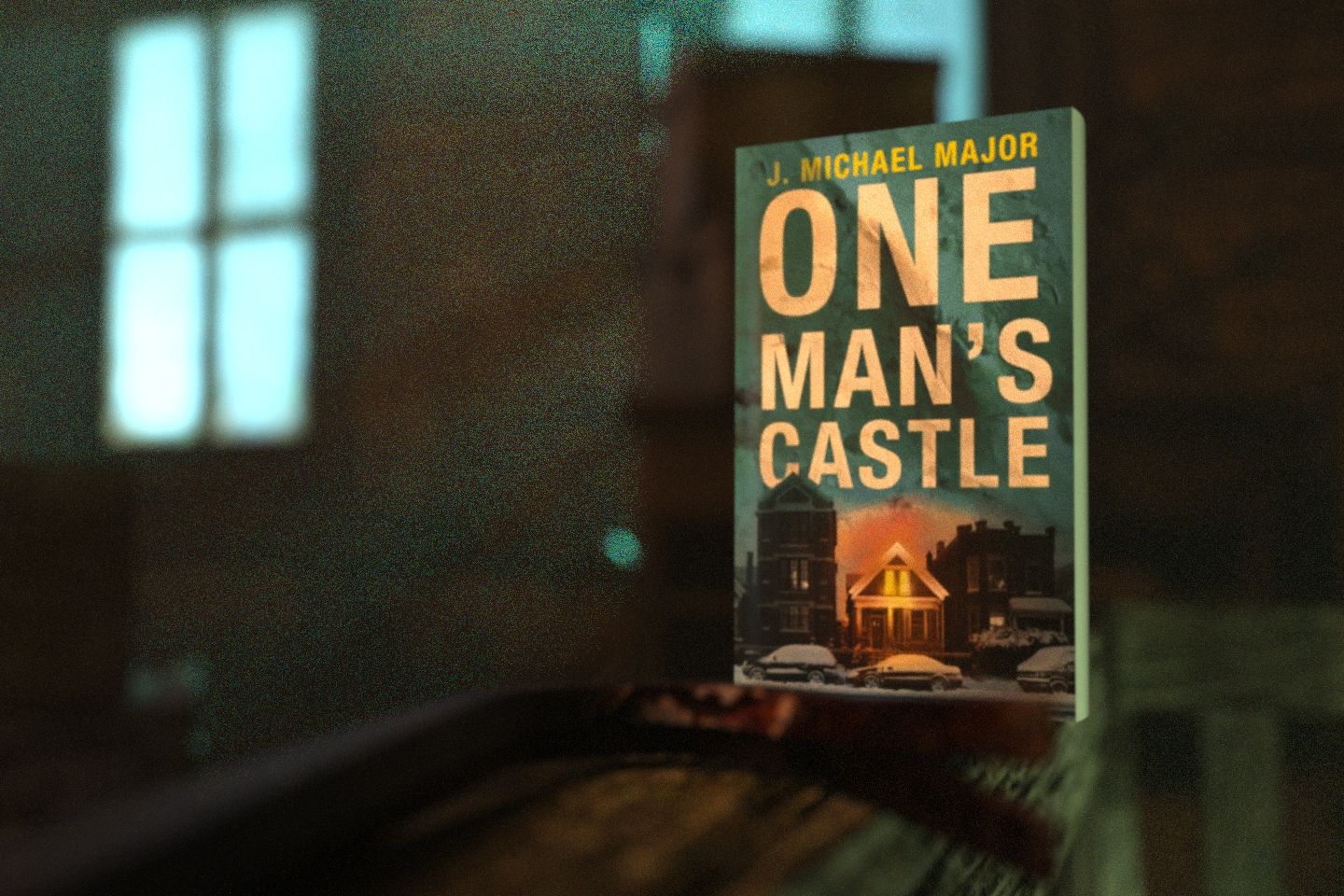 The paperback edition of One Man's Castle, as it appears in the creepy attic depicted on the cover.